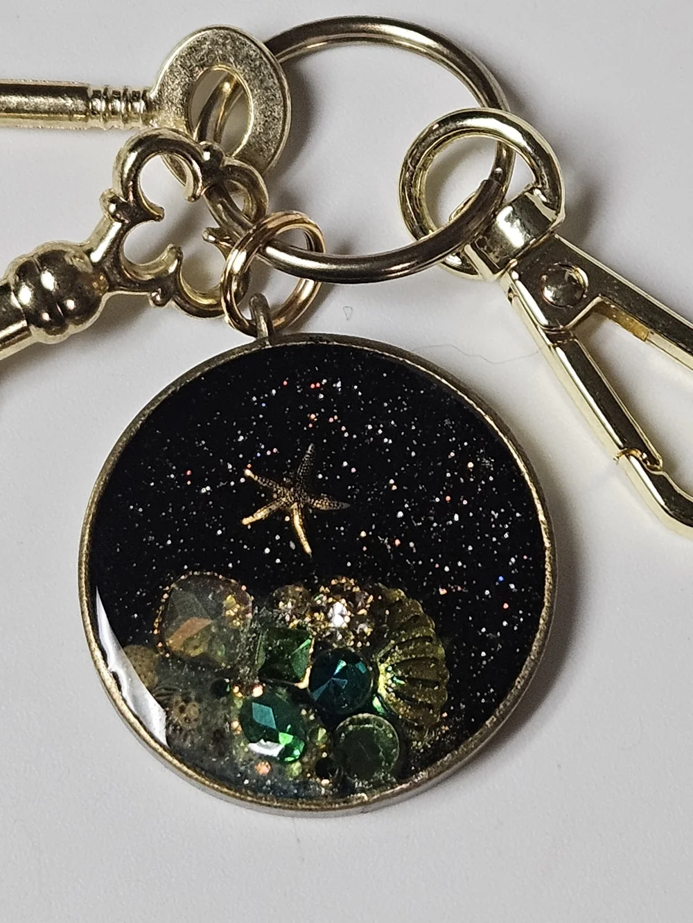 Gold Acquatic Keychain Bag Charm Black Galaxy and Green Crystal Accents